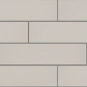 Light beige rectangular tiles arranged in a staggered horizontal brick pattern.